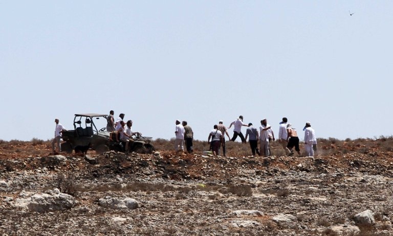 Settlers bulldoze lands in Burin, south of Nablus