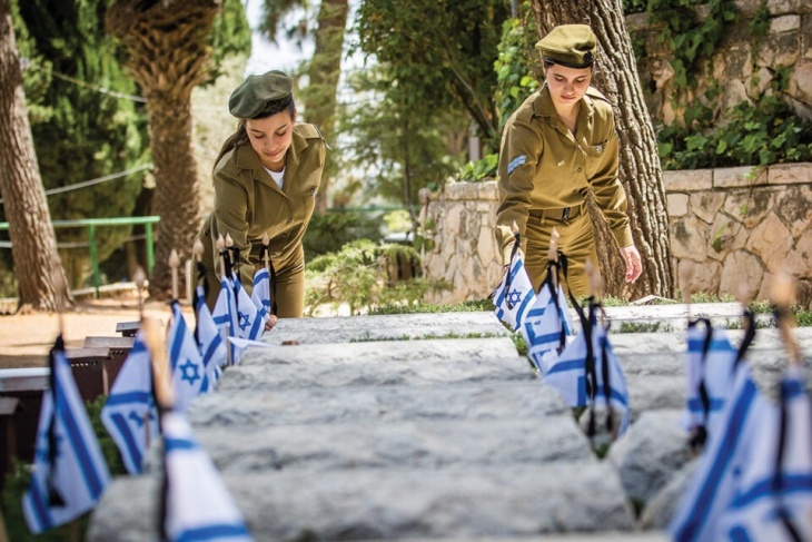 Israeli media: a historical precedent.. Abu Dhabi holds a memorial ceremony for the dead of the Israeli army