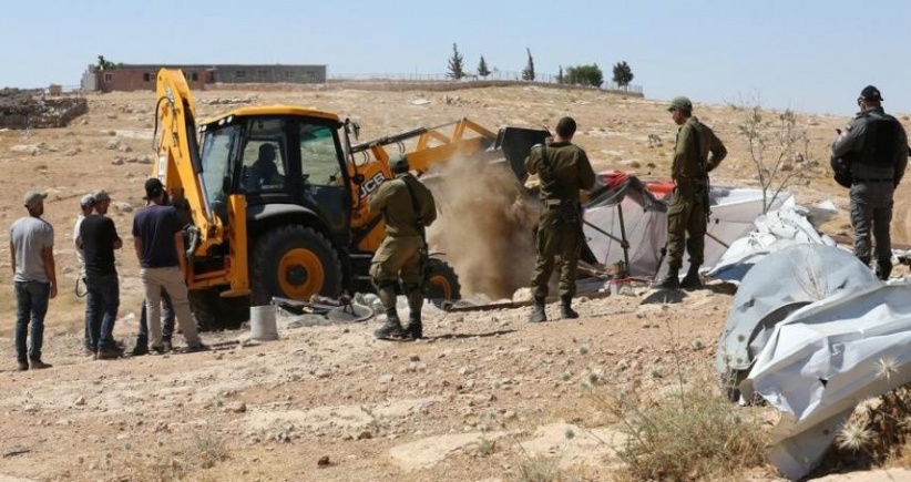 The occupation notifies the removal of a residential tent and a solar energy unit in the Jordan Valley