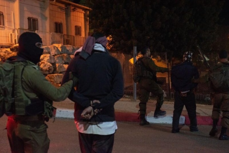 The occupation arrests two civilians from the village of Al-Mughayyir