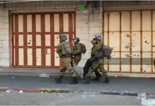 Video- The occupation arrests a child after being injured in Hebron
