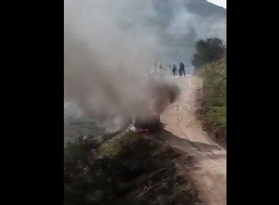 Settlers attack workers and burn a bulldozer south of Nablus