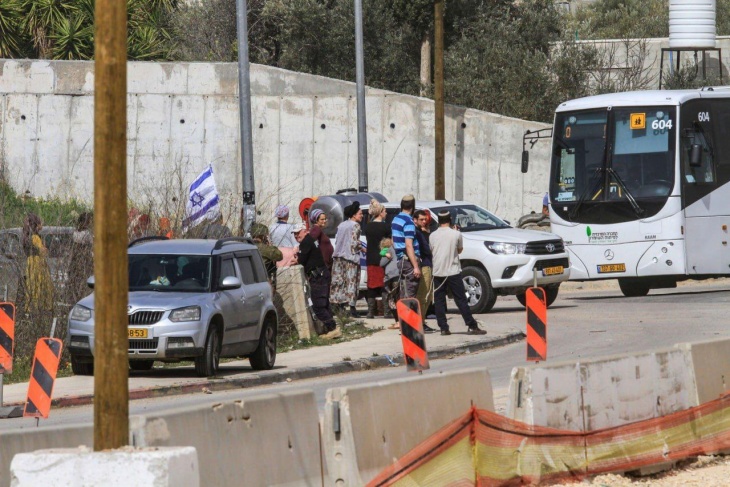 Two civilians were injured and several vehicles were destroyed in a settler attack west of Nablus